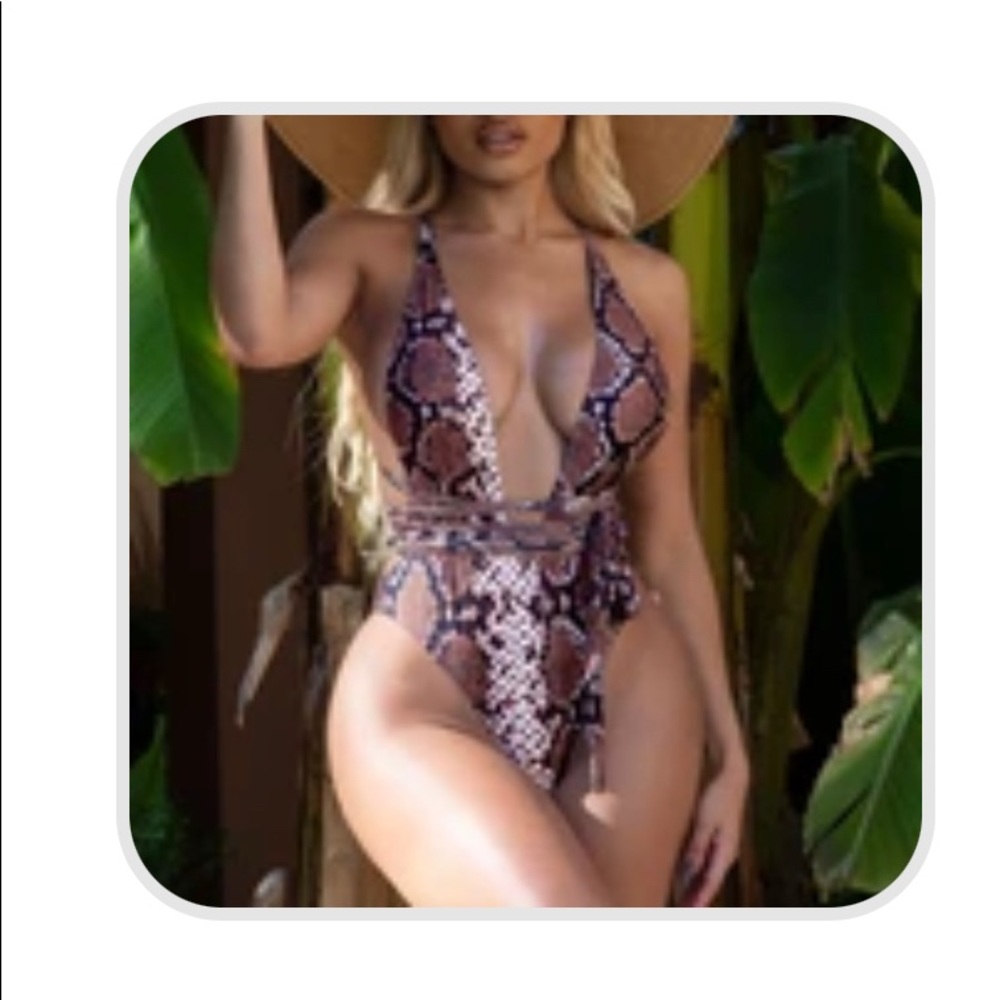 Never worn! Snake One Piece